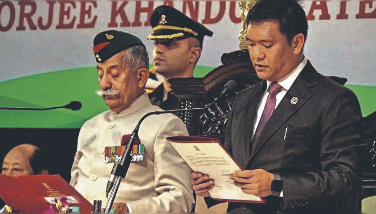 Arunachal Pradesh Governor Brig (Retd) BD Mishra (L) administering oath to Pema Khandu as the state's Chief Minister. Credit: PTI File Photo