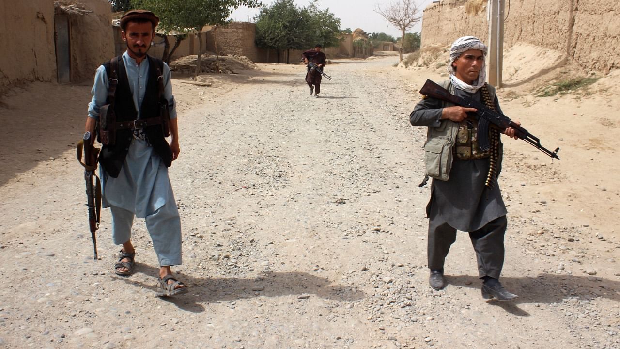 Armed Afghan militias patrol on the outskirts of Takhar province. Credit: Reuters File Photo