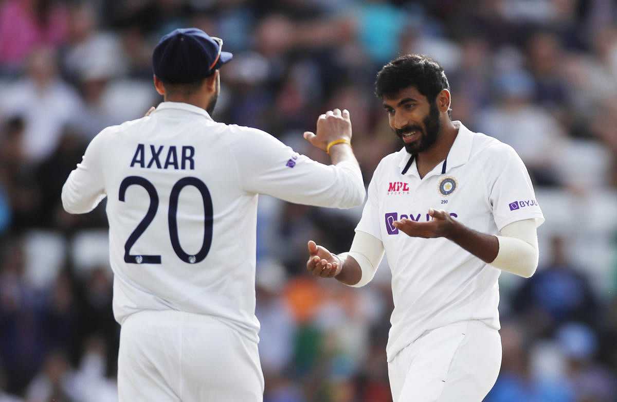 India's Jasprit Bumrah celebrates taking the wicket of England's Joe Root. Credit: Reuters Photo