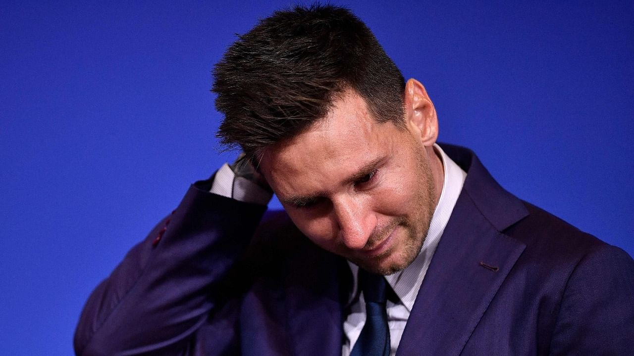 Barcelona's Argentinian forward Lionel Messi cries during a press conference at the Camp Nou stadium in Barcelona. Credit: AFP Photo