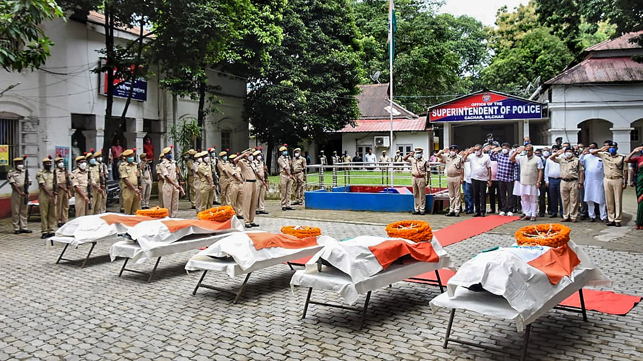  Assam Chief Minister Himanta Biswa Sarmah pays homage to the 6 Assam Police personnel who died in Monday's clashes at Lailapur on the Assam-Mizoram border, in Silchar. Credit: PTI Photo