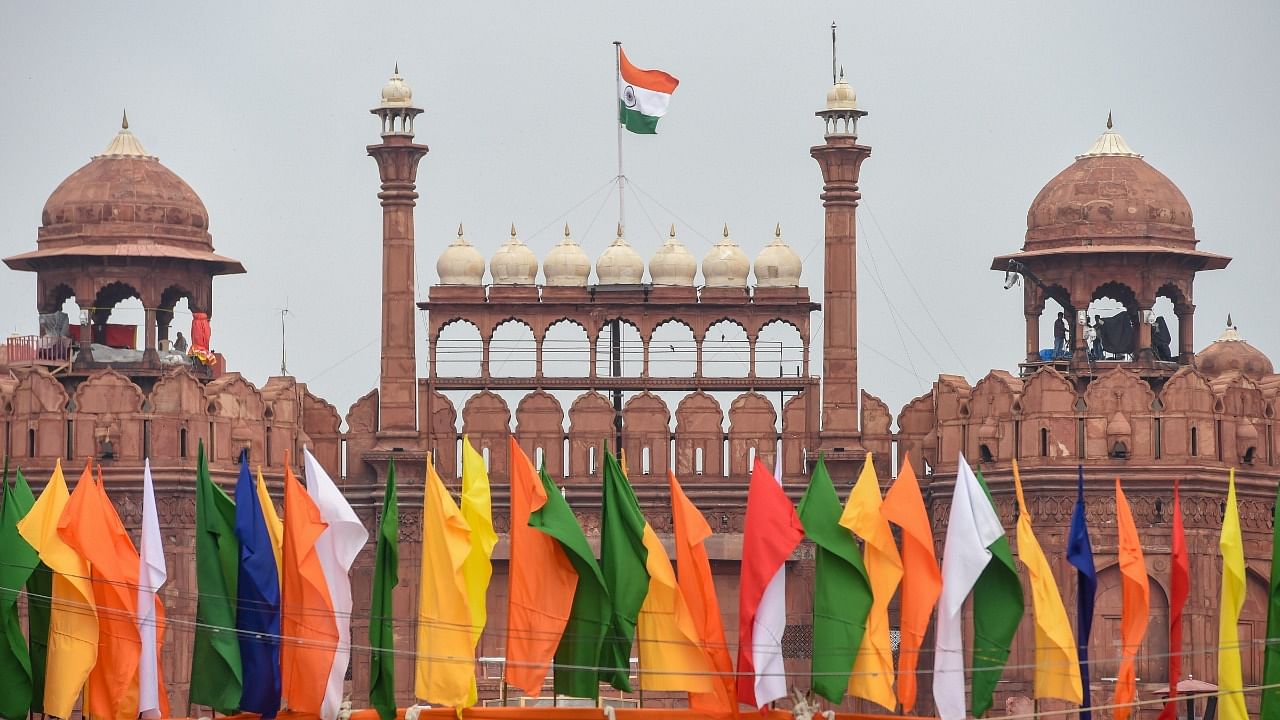  Indian national flag flutters atop the historic Red Fort on the eve of 74th Independence Day. Credit: PTI File Photo