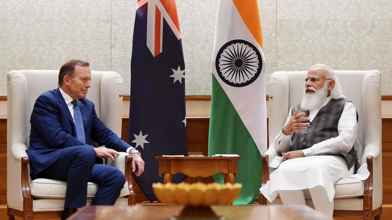 Prime Minister Narendra Modi with former Australian prime minister Tony Abbott during a meeting, in New Delhi. Credit: Twitter Photo/@narendramodi
