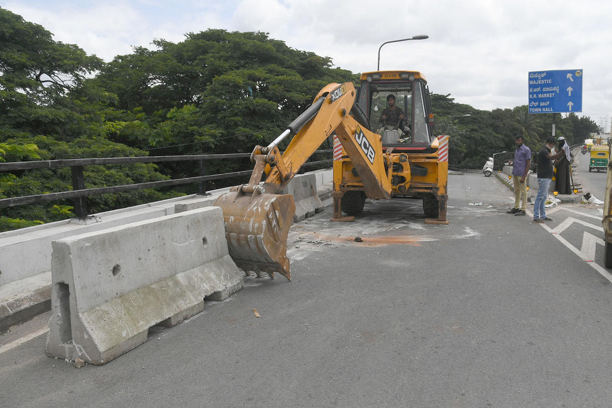Earthmover employed on the flyover for the culvert work. Credit: DH Photo/S K Dinesh