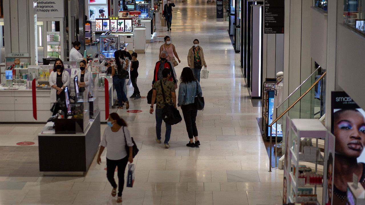 People walk by a Macy’s Store in Midtown New York. Credit: AFP Photo