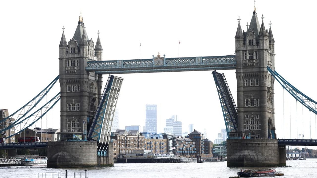 Tower Bridge is seen stuck in the open position, due to a technical fault, in London. Credit: Reuters Photo