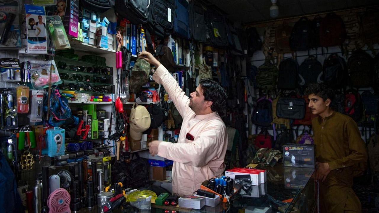 Once brimming with combat boots, flak jackets and other war paraphernalia, the smugglers' markets in Pakistan are being forced to rethink their business model as foreign troops exit Afghanistan and contraband dries up. Credit: AFP Photo