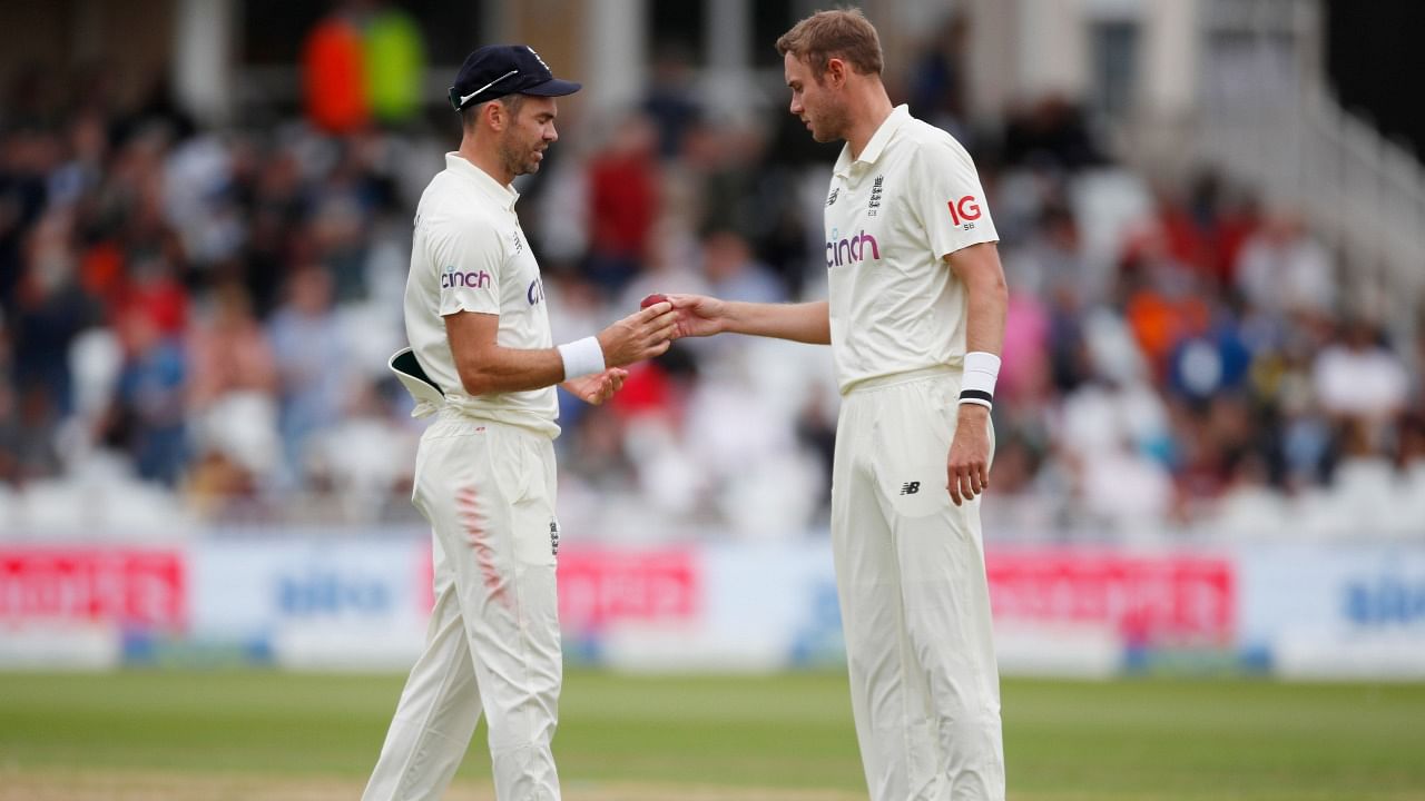 England's James Anderson and Stuart Broad. Credit: Reuters Photo