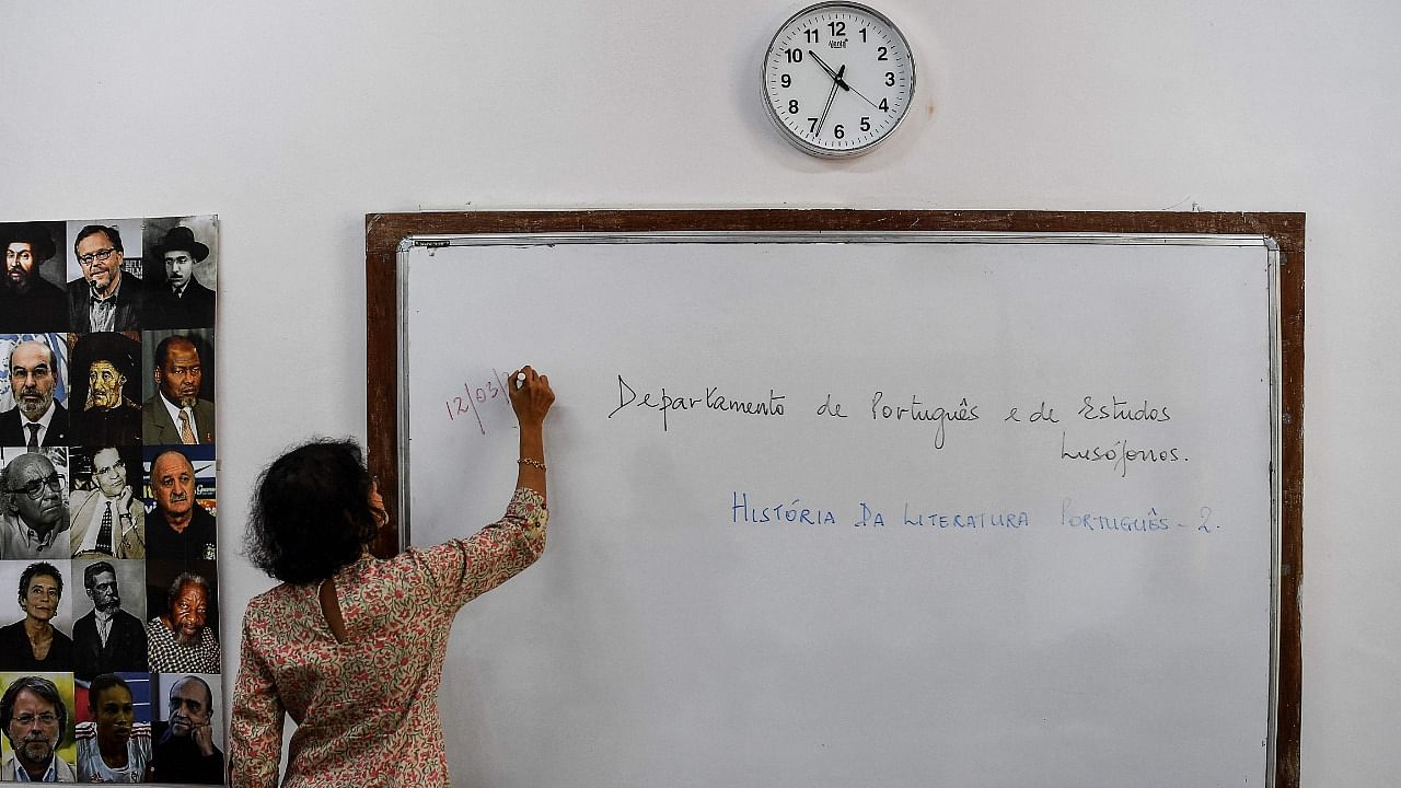 Lorraine Alberto conducting her Portuguese class. Credit: AFP Photo