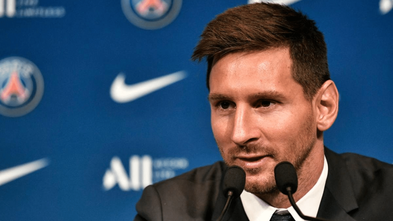 Argentinian football player Lionel Messi speaks at a press conference during his unveiling at the French football club Paris Saint-Germain's (PSG) Parc des Princes stadium in Paris. Credit: AFP Photo