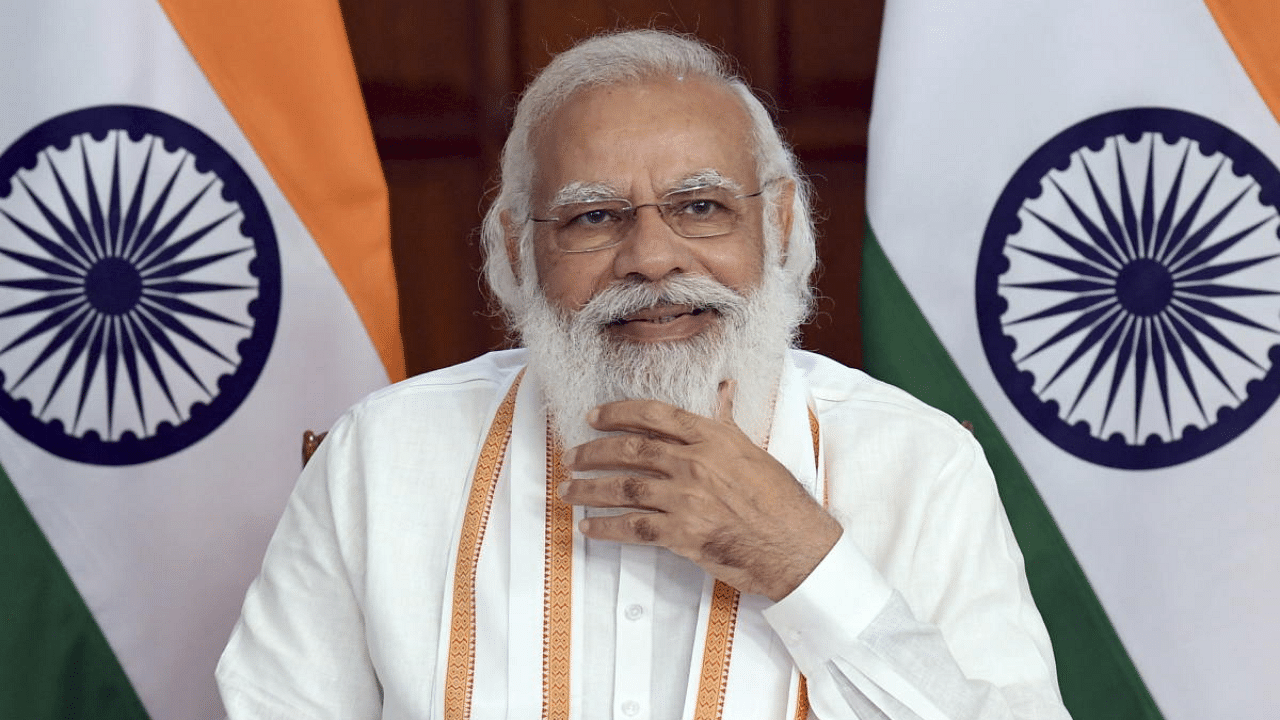 Prime Minister Narendra Modi at the launch of the Ujjwala 2.0 (Pradhan Mantri Ujjwala Yojana - PMUY) in Uttar Pradesh, through video conferencing, in New Delhi. Credit: PTI Photo