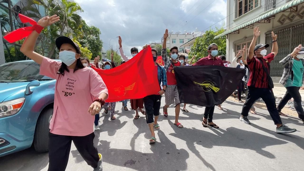 Anti-coup protesters march on the anniversary of a 1988 uprising, in Mandalay, Myanmar August 8, 2021 in this still image obtained by Reuters from a social media video. Credit: Reuters photo