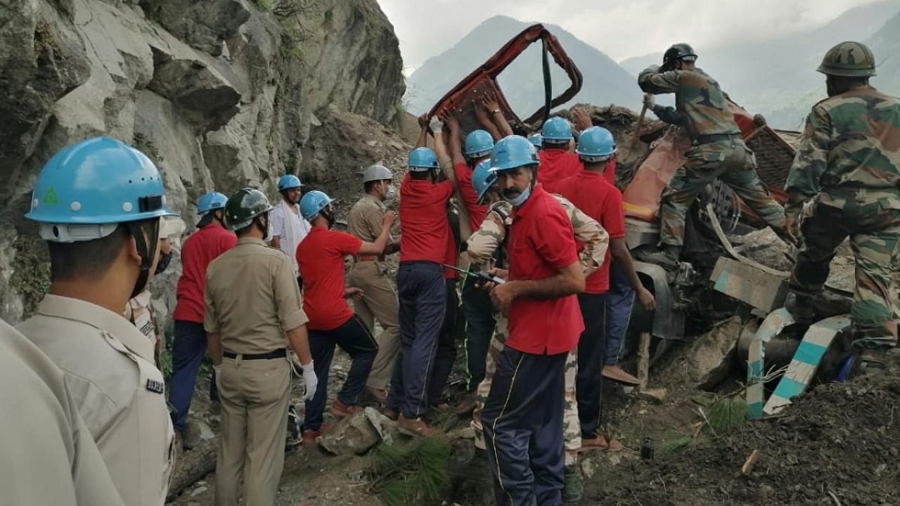 Indo-Tibetan Border Police (ITBP) personnel remove a damaged truck during a rescue operation at the site of a landslide in Kinnaur district in the northern state of Himachal Pradesh, India, August 11, 2021. Credit: Indo-Tibetan Border Police/Handout via Reuters