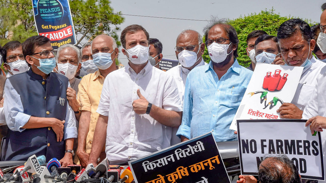 Congress leader Rahul Gandhi along with other opposition leaders, interacts with media after a protest march against curtailment of the Monsoon Session of Parliament, at Vijay Chowk. Credit: PTI Photo