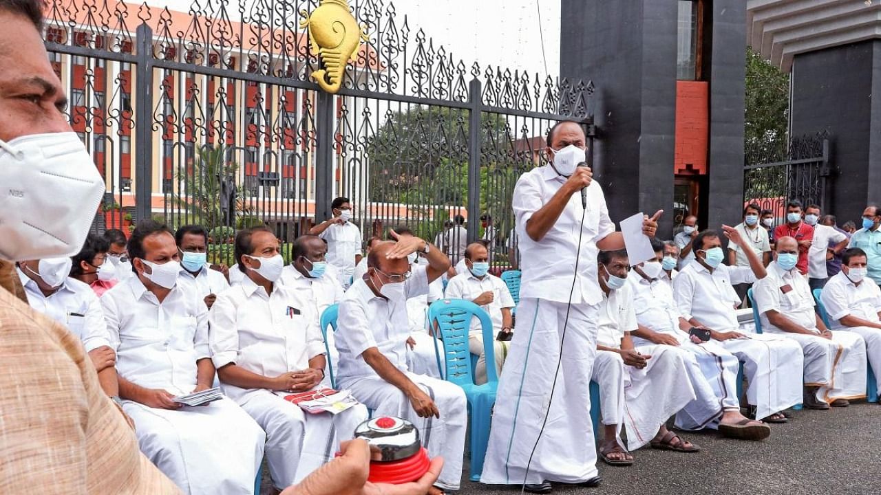 Opposition leaders boycott the Kerala Assembly session and stage a protest outside the State Assembly demanding the resignation of CM Pinarayi Vijayan over the alleged dollar smuggling case, in Thiruvananthapuram, Thursday, August 12, 2021. Credit: PTI Photo