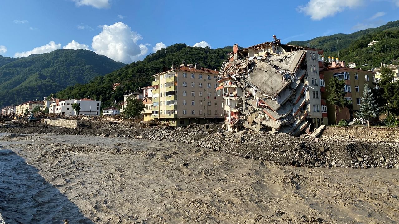 A view of  partially collapsed building as the area was hit by flash floods that swept through towns in the Turkish Black Sea region, in the town of Bozkurt. Credit: Reuters Photo