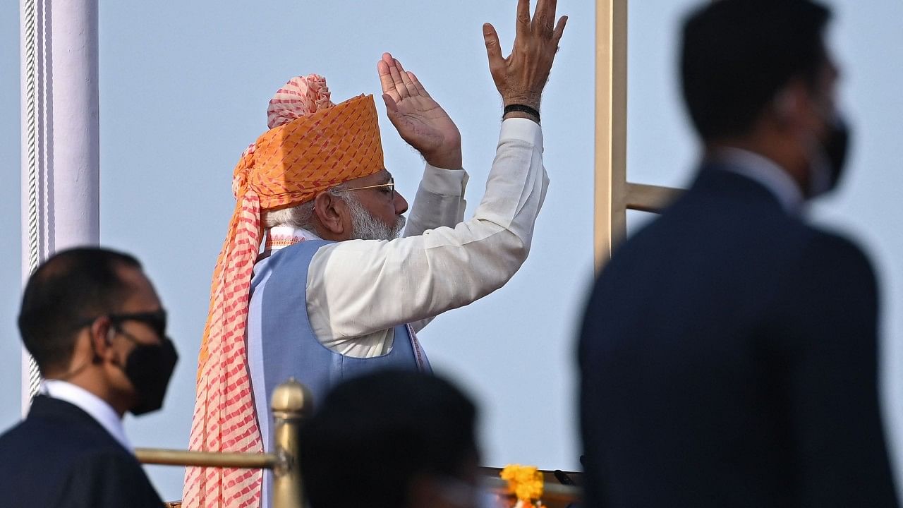Prime Minister Narendra Modi (C) gestures while addressing the nation from the ramparts of the Red Fort. Credit: AFP
