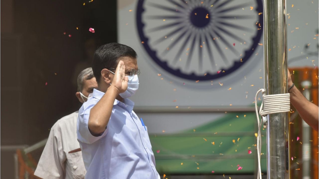 Delhi Chief Minister Arvind Kejriwal celebrates the 75th Independence Day celebration at Delhi Secretariat in New Delhi, Sunday. Credit: PTI Photo