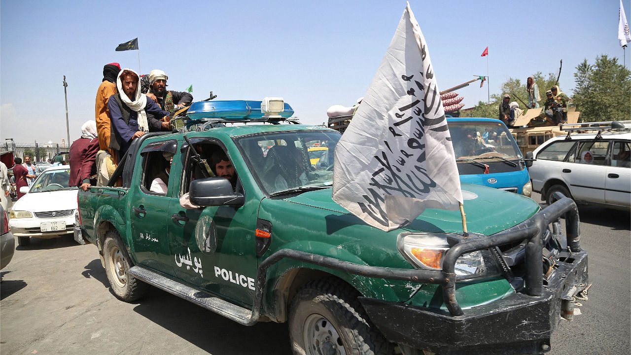  Taliban fighters patrol the streets of Kabul on August 16, 2021, after a stunningly swift end to Afghanistan's 20-year war. Credit: AFP Photo