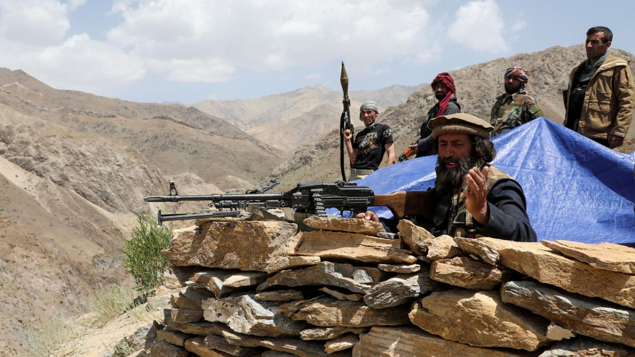 Armed men who were against Taliban uprising at their check post, at the Ghorband District, Parwan Province, Afghanistan. Credit: Reuters Photo