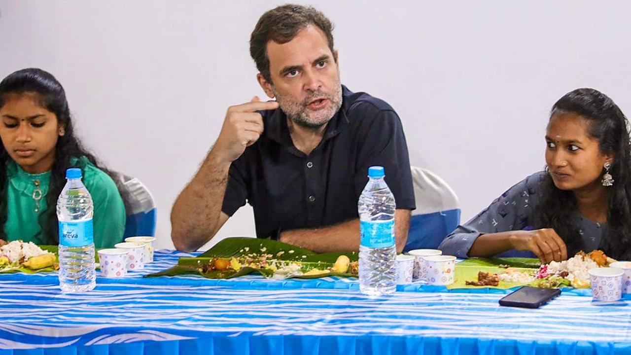 Congress leader Rahul Gandhi has lunch and interaction with CLAT winners at Forest IB in Mananthavady. Credit: PTI Photo