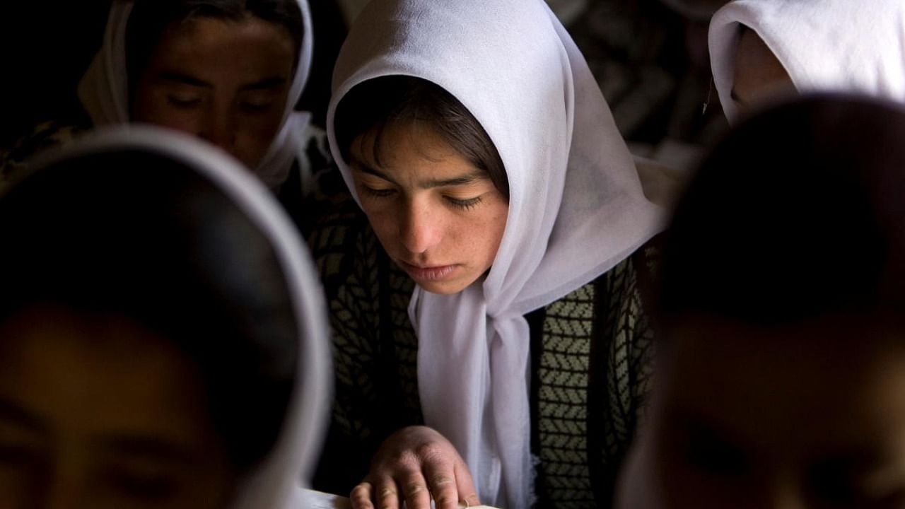 Afghan girls attend a class at the Ishkashim high school for girls in the northeastern province of Badakhshan, near the border with Tajikistan. Credit: Reuters file photo