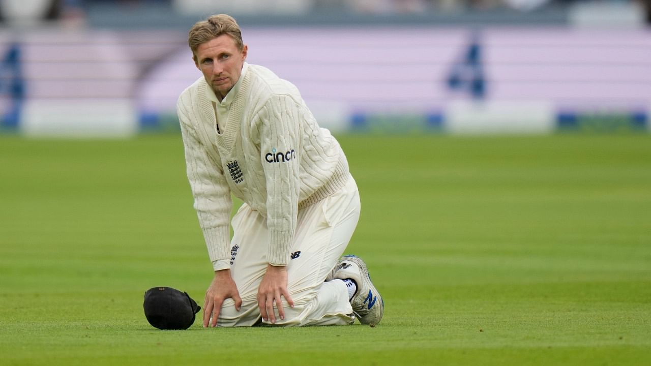 England's Joe Root looks round after failing to stop the ball during the fifth day of the 2nd cricket test between England and India at Lord's. Credit: AP/PTI Photo