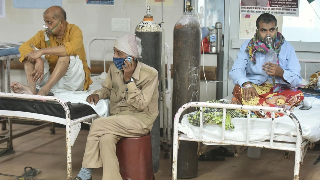 Covid-19 patients undergo treatment at LLR Hospital, amid a surge in coronavirus cases in record numbers across the country, in Kanpur. Credit: PTI Photo