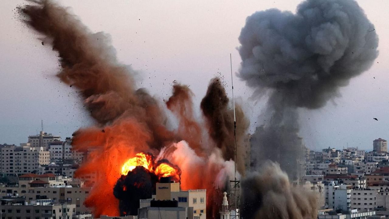 Smoke billows after an Israeli airstrike on Gaza City targeted the Ansar compound, linked to the Hamas movement, in the Gaza Strip. Credit: AFP Photo