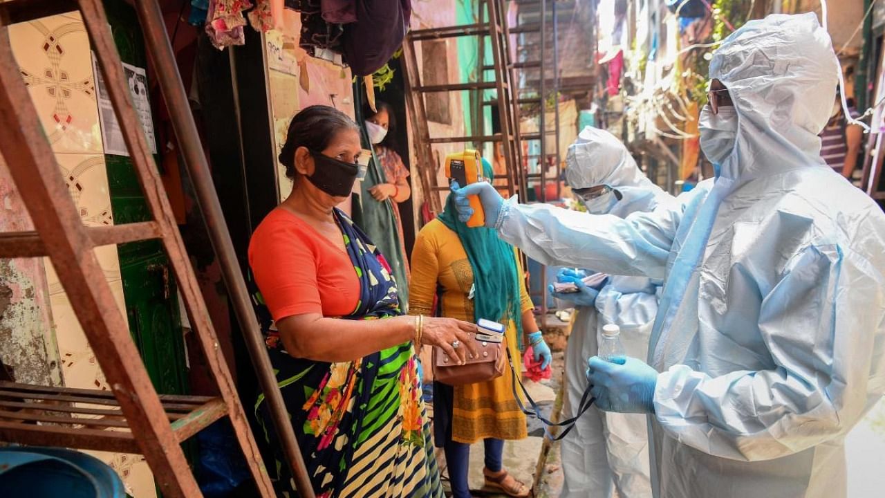 Healthcare workers ar work in Dharavi. Credit: AFP File Photo 