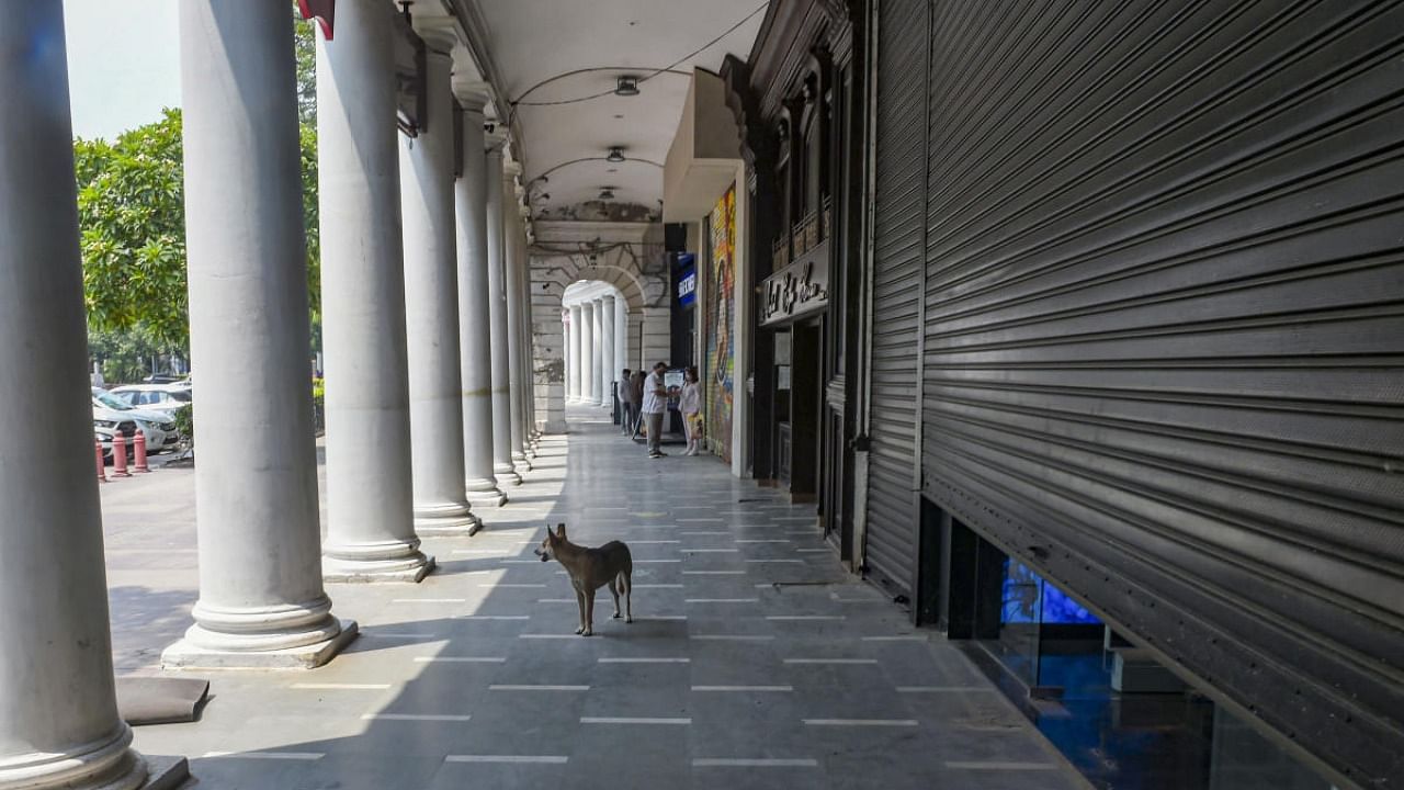 A partially opened market at the Connaught Place after further ease in the Covid-19 lockdown, in New Delhi. Credit: PTI Photo