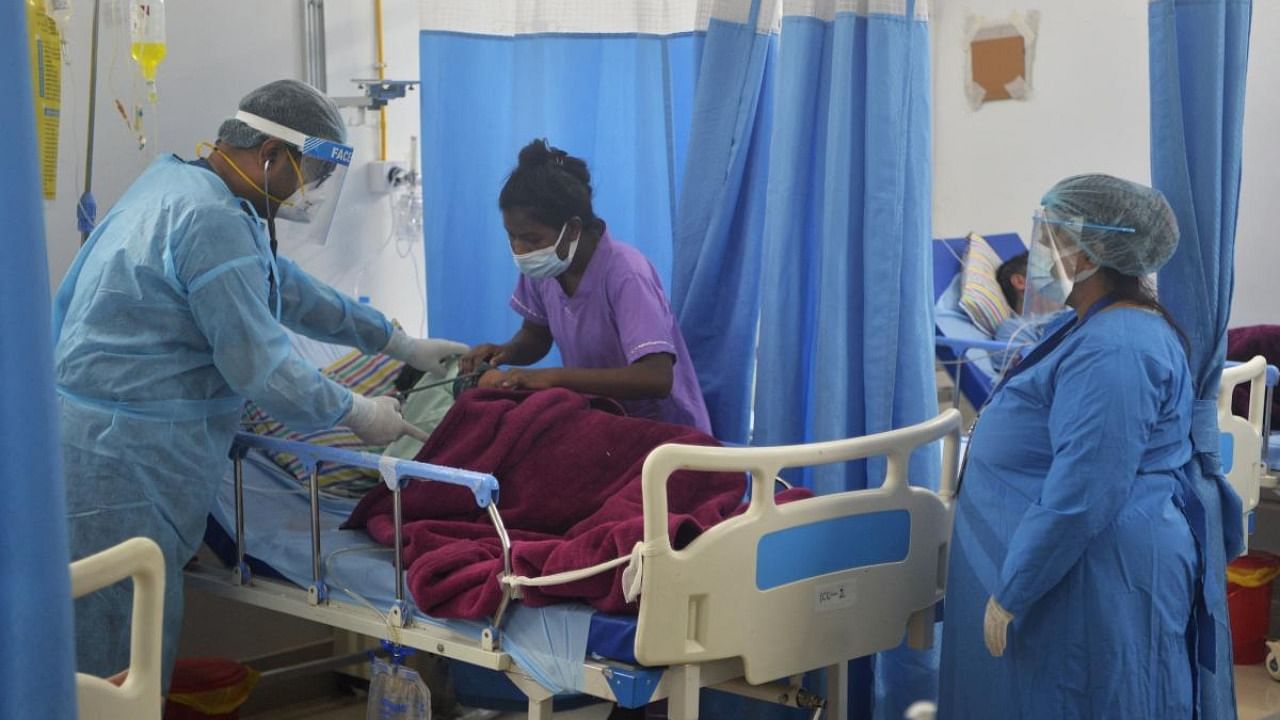 Along with the pandemic, India's healthcare workers are also coping with rising instances of violence. Credit: AFP Photo