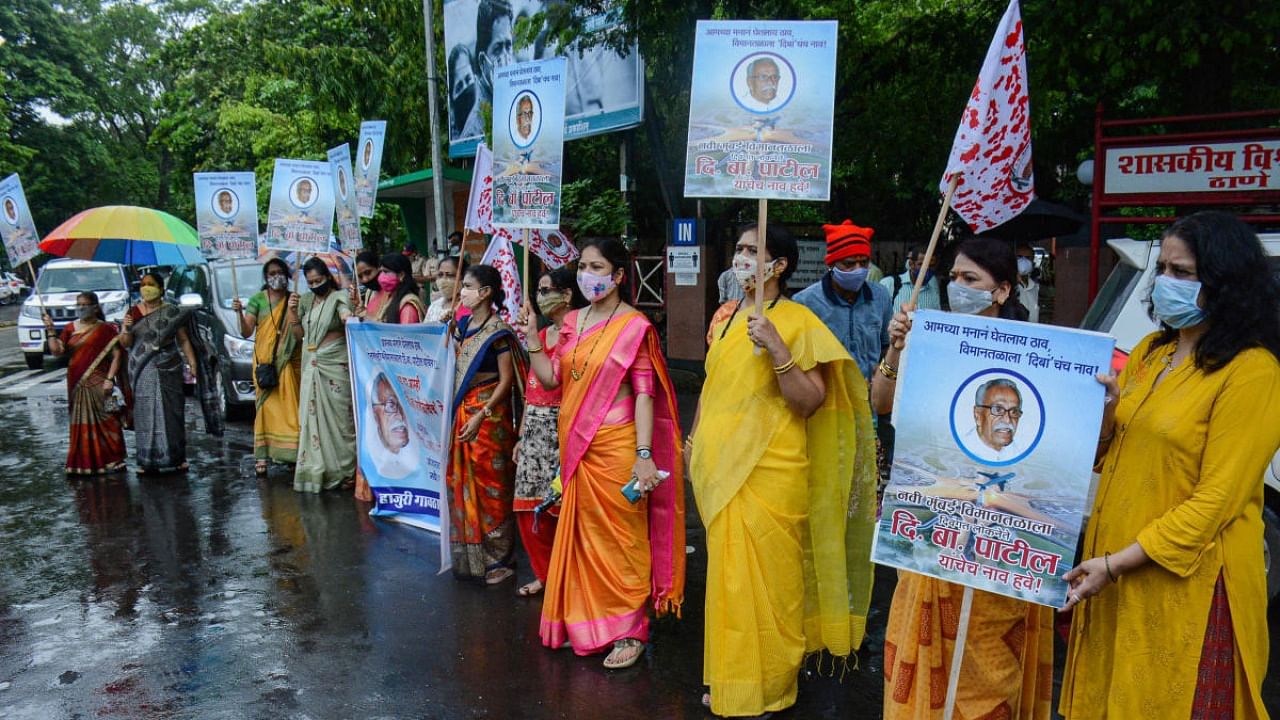 Agari Community (local community) organises an agitation with a human chain on a road, demanding leader DB Patil's name to be given to Navi Mumbai Airport, in Thane. Credit: PTI FILE PHOTO