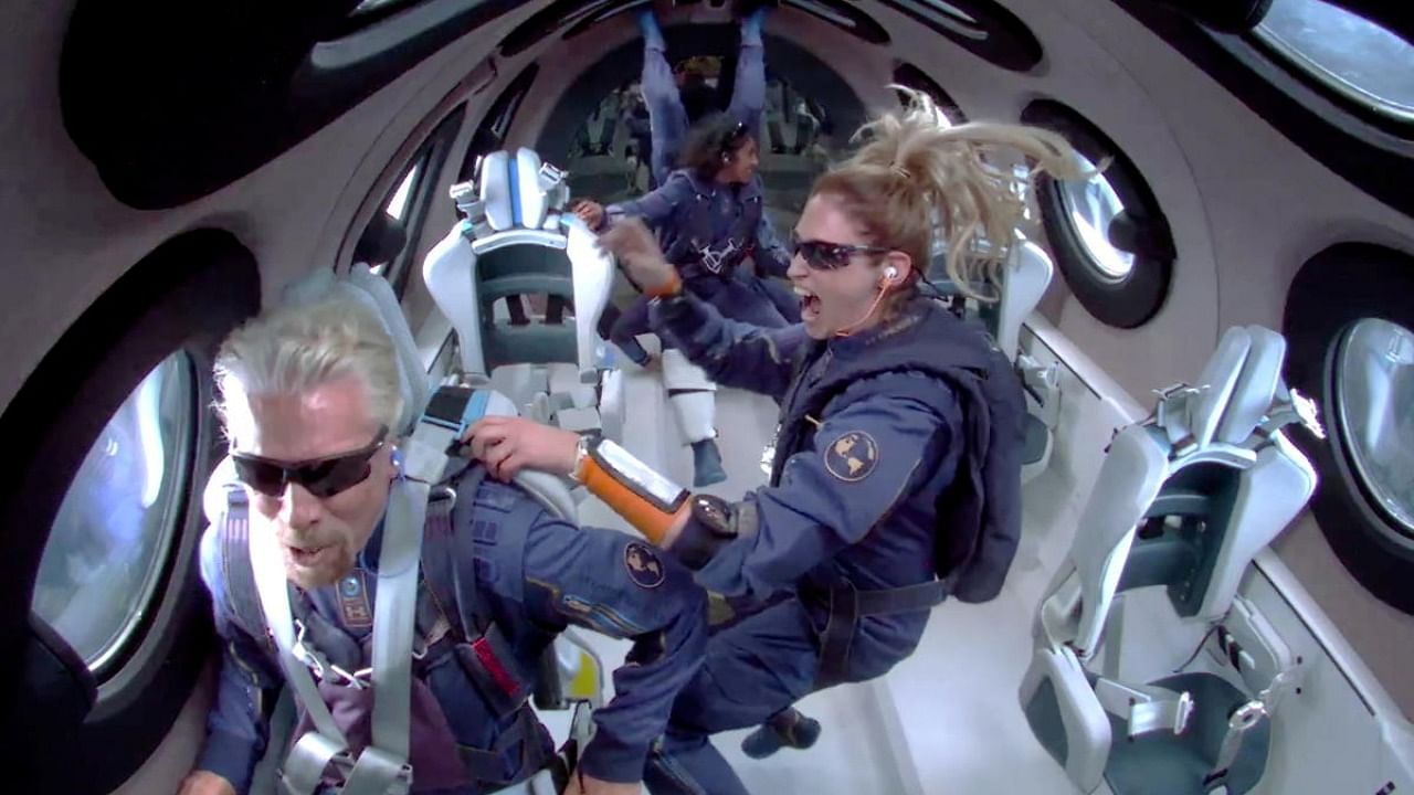 Billionaire Richard Branson speaks as crew members float in zero gravity above Spaceport America. Credit: Reuters Photo