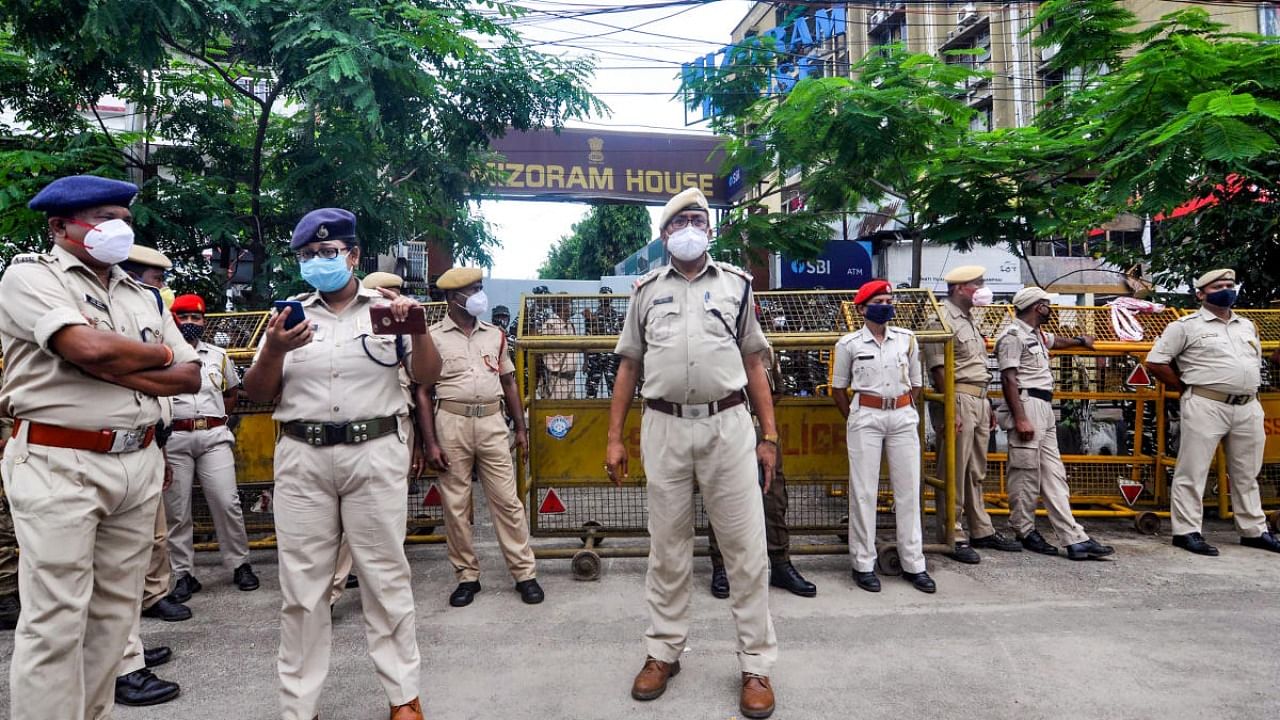  Assam security personnel stand vigil outside the Mizoram House in Guwahati, Thursday, July 29, 2021. Assam and Mizoram police personnel clashed at the border killing atleast 7 and injuring many more. Credit: PTI Photo
