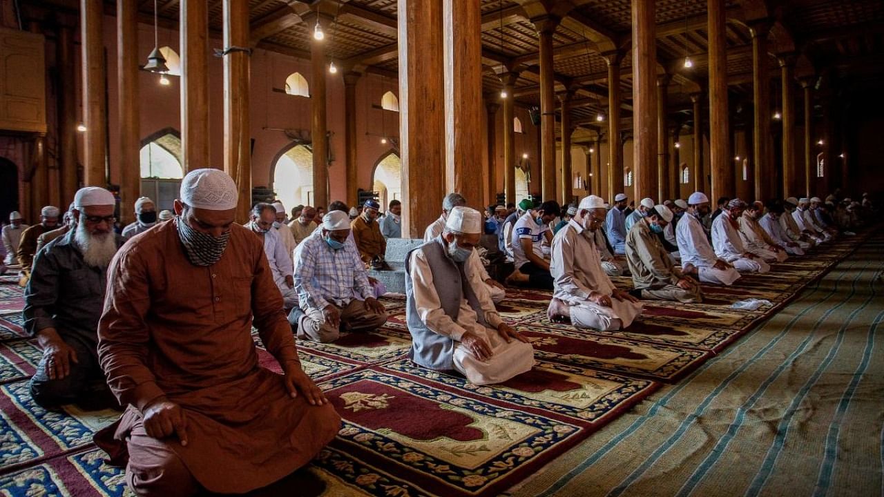 Muslim devotees offer Friday congregational prayers at the Jamia Masjid mosque in Srinagar. Credit: AFP Photo