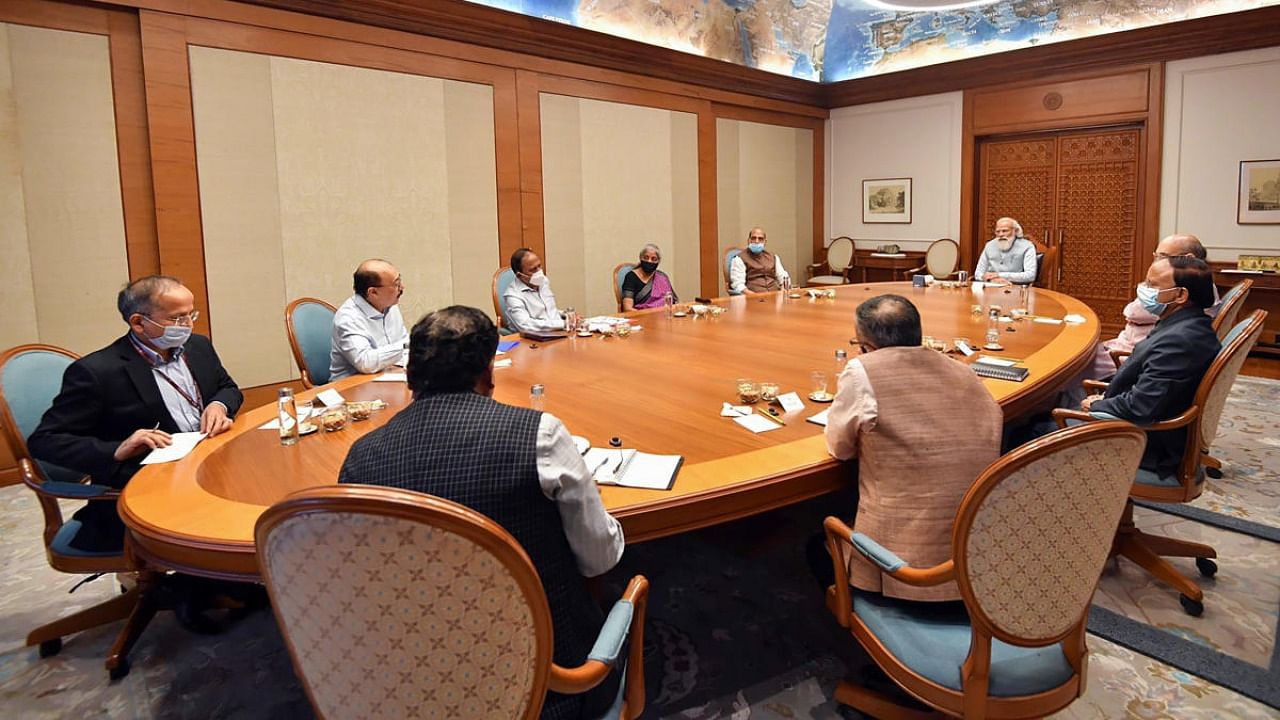 Prime Minister Narendra Modi chairs a meeting of Cabinet Committee on Security (CCS) in the wake of Taliban capturing power in Afghanistan, in New Delhi. Credit: PTI Photo