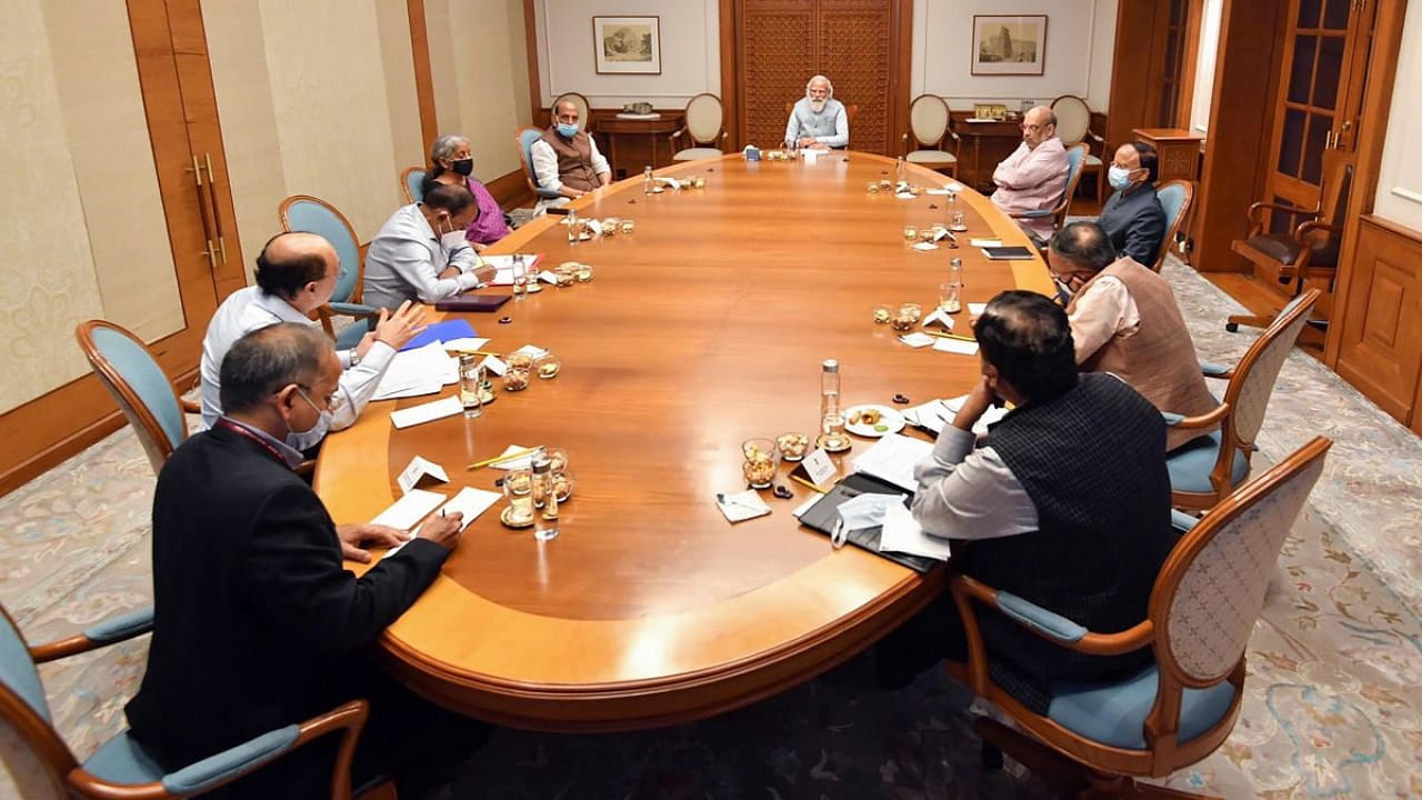 Prime Minister Narendra Modi chairs a meeting of Cabinet Committee on Security (CCS) in the wake of Taliban capturing power in Afghanistan, in New Delhi. Credit: PTI Photo