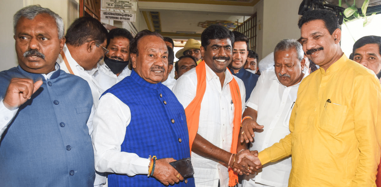 BJP State president Nalinkumar Katil greets Muniraju Gowda P M BJP candidate for Legislative council election after submit nomination paper at Vidhana Soudha in Bengaluru on Thursday. Credit: DH Photo