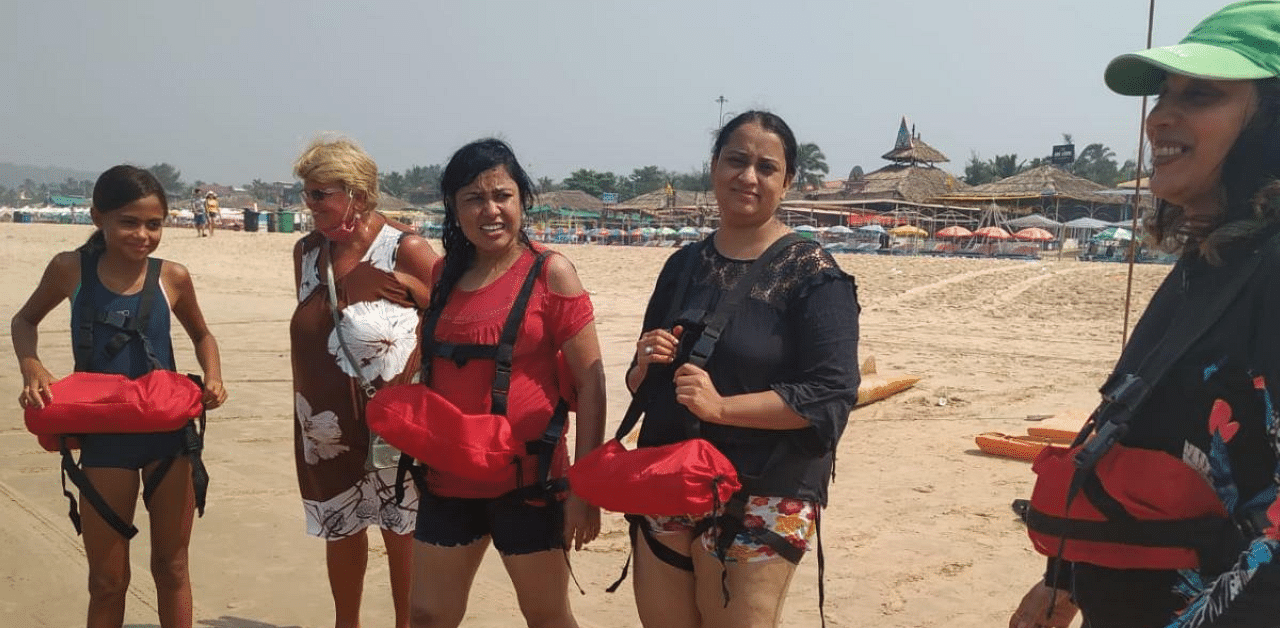 Women being taught best swimming practices at a Goa beach as part of the 'Swim with Lifesavers' campaign. Credit: DH Photo