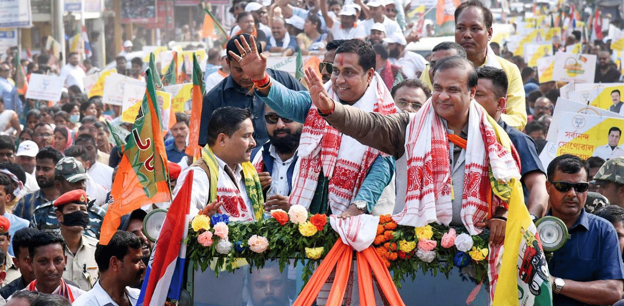 BJP candidate Jayanta Malla Baruah of Nalbari constituency along with NEDA convener Himanta Biswa Sarma on his way to file his nomination for the State Assembly Election 2021, in Nalbari. Credit: PTI Photo
