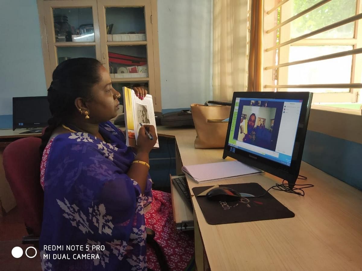 A teacher at Shradhanjali Integrated School, Lingarajapuram. Subject experts and sign language experts have to work together to communicate with hearing-impaired students.