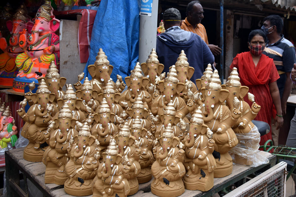 Ganesha idols on sale in Pottery Town. The government has capped the height of idols at four feet for public display and two feet for home. DH PHOTOS BY S K DINESH.
