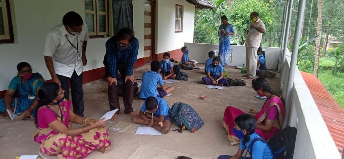 Teachers conduct classes for students under Vidyagama scheme. DH File Photo