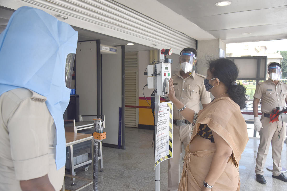 All Metro stations in the city have thermal scanners. Passengers who are found to have temperature above normal are immediately sent to the nearest government hospital. DH Photo by S K Dinesh