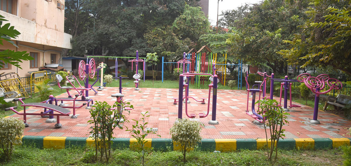 Even after public parks reopened in May, the open-air gyms remained closed for public use. However, over the past few months, there has been a steady increase in the number of people relying on these facilities. (Above) A park at BTM layout. DH Photo by S