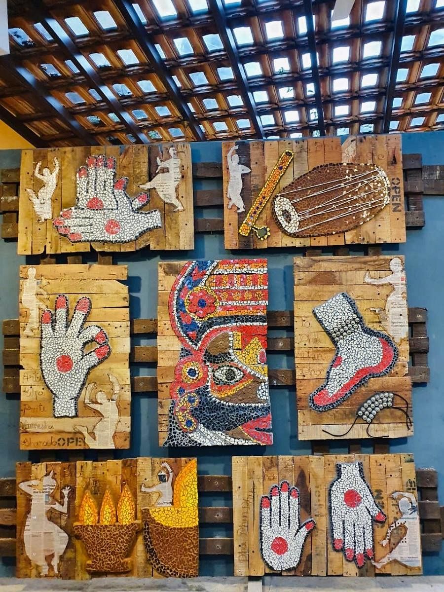 This mural based on Indian dance mudras was made using construction waste.