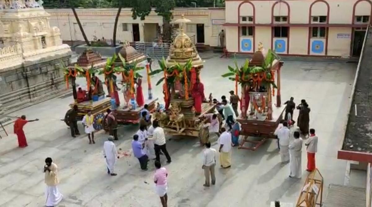 Procession of the golden chariot held in the presence of the staffers at Male Mahadeshwara temple, Hanur taluk, Chamarajanagar district, on Monday.