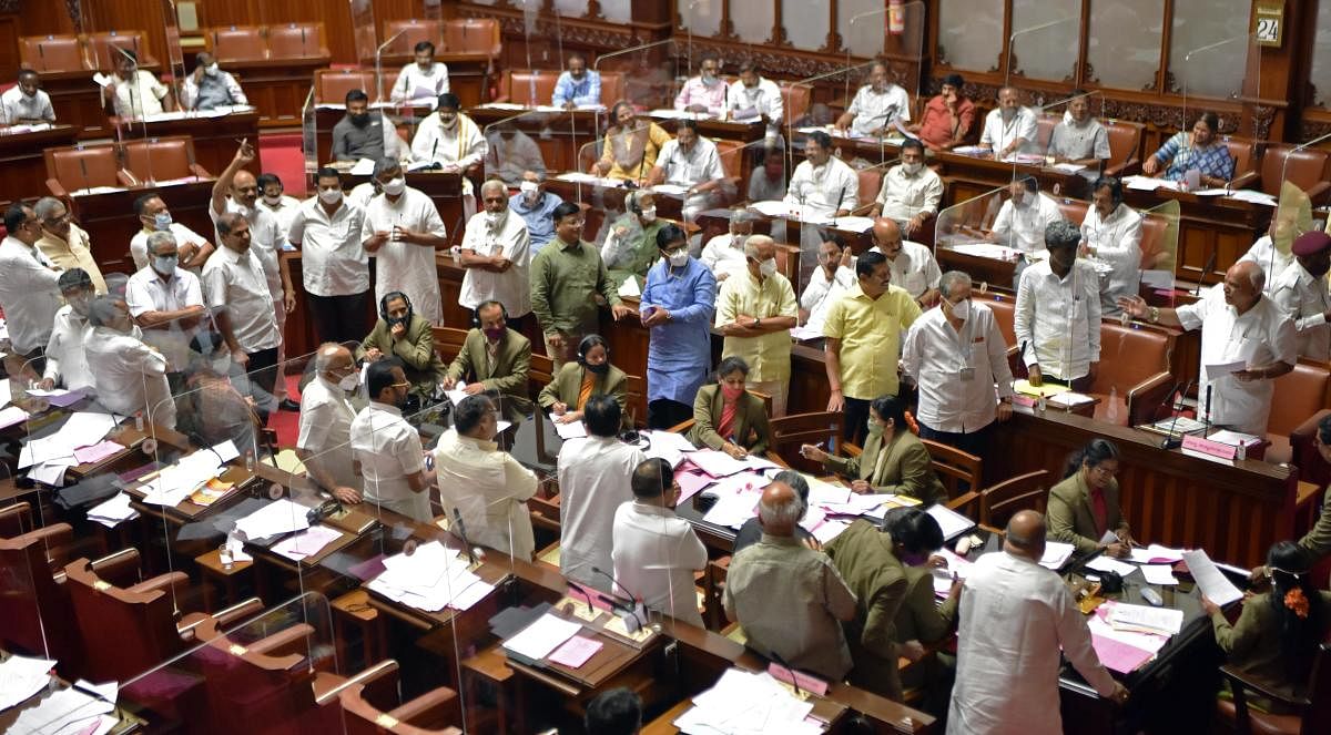 Chief Minister B S Yediyurappa replies to the debate on the budget proposals amid protest by the Opposition in the Legislative Council on Wednesday. DH Photo/Anup Ragh T