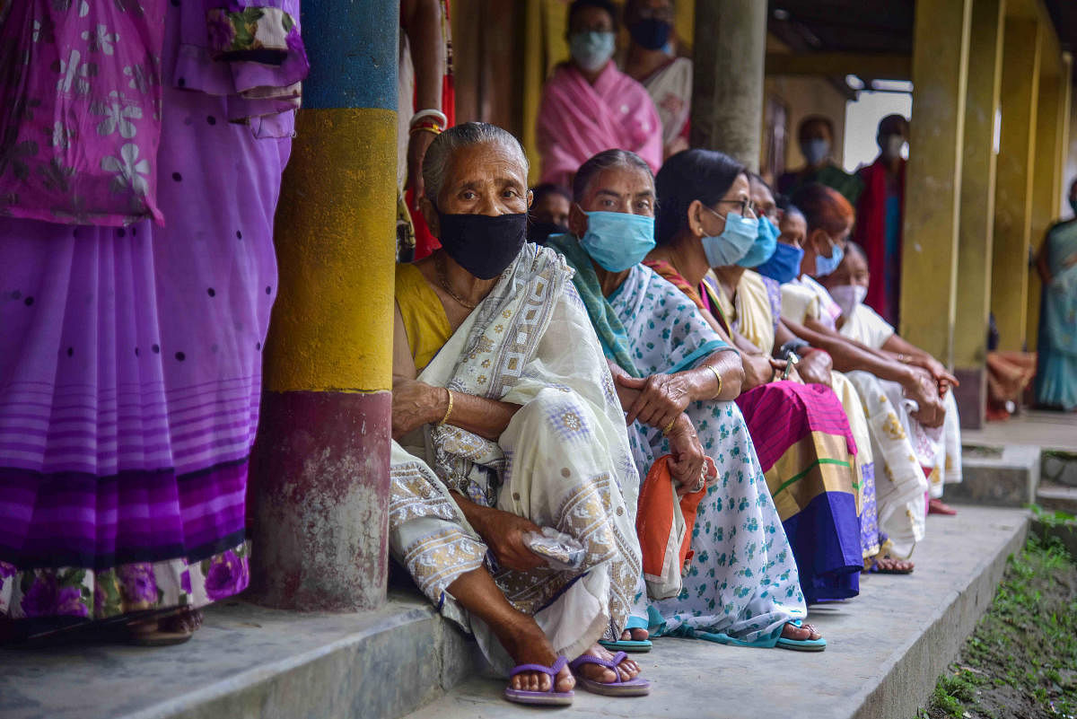 Citizens wait to receive Covid-19 vaccines in Assam's Nagaon. Credit: PTI Photo